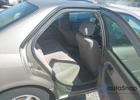 1999 Toyota Camry Le from USA, damaged, VIN 4T1BG22K5XU488052